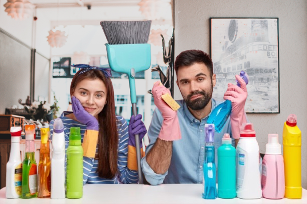 horizontal-view-attractive-woman-with-dark-hair-wears-headband-protective-gloves-sit-closely-each-other-surronded-with-cleaning-agent_273609-25247-removebg-preview